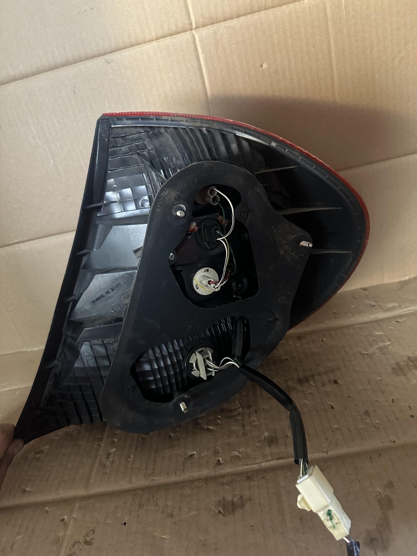 2003 V30 Left Taillight