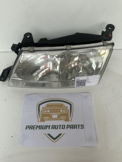 2001  X10 Left Headlight