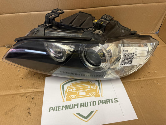 2009  E93 Left Headlight