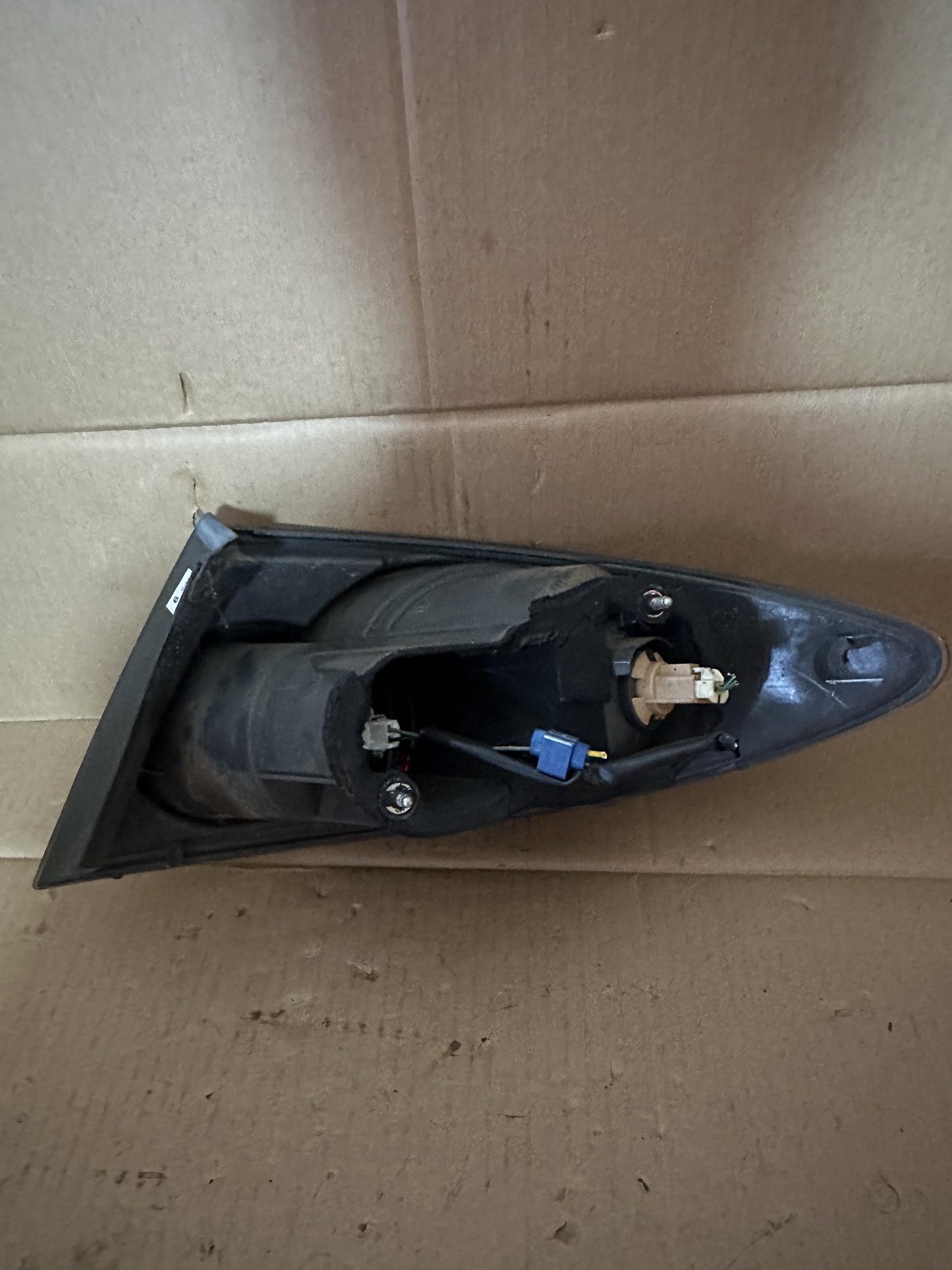 2004  6 Left Taillight