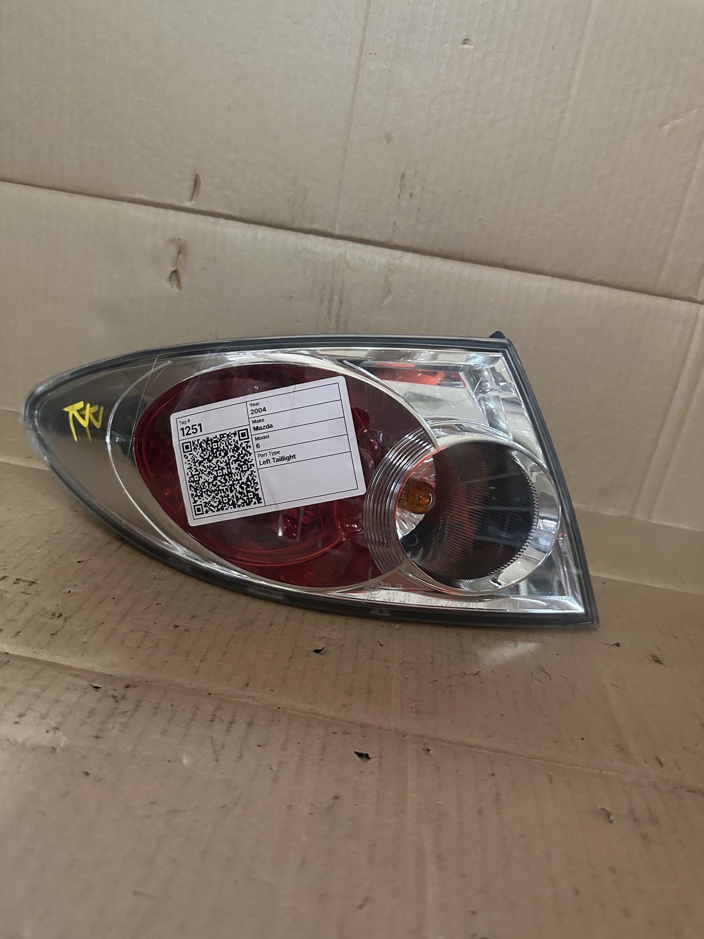 2004  6 Left Taillight