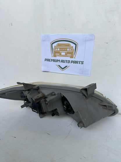 2006  XV40 Left Headlight