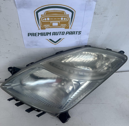2006  W20 Left Headlight