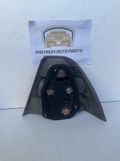 2003  E120 Left Taillight