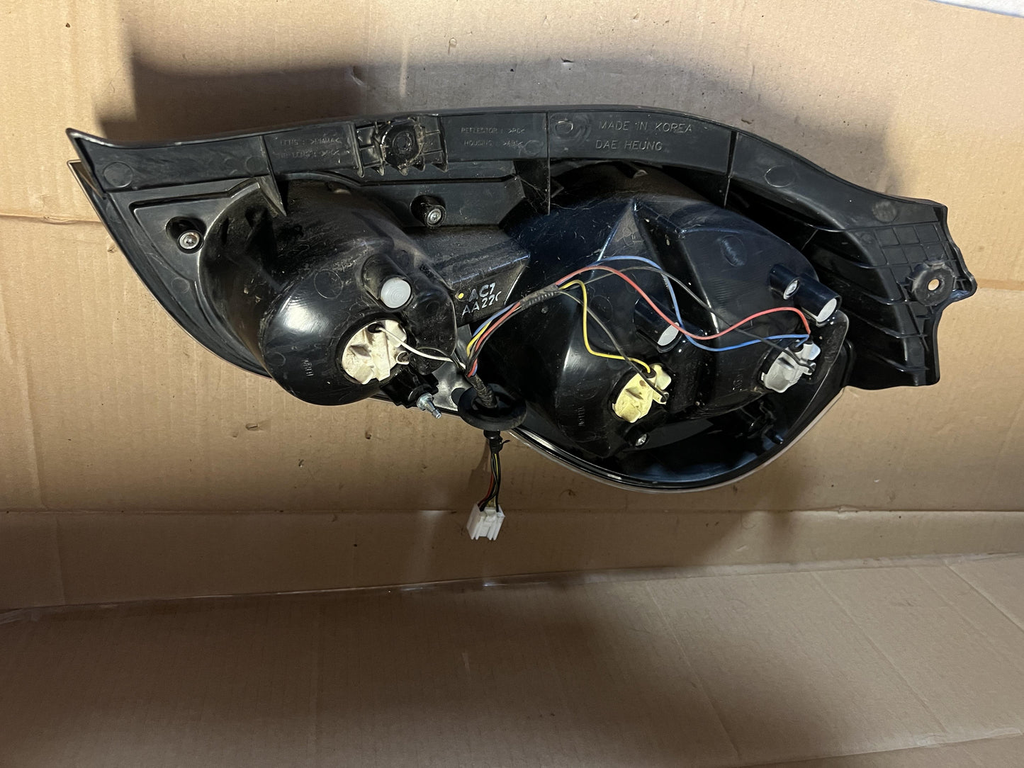 2011  Barina, Spark Left Taillight