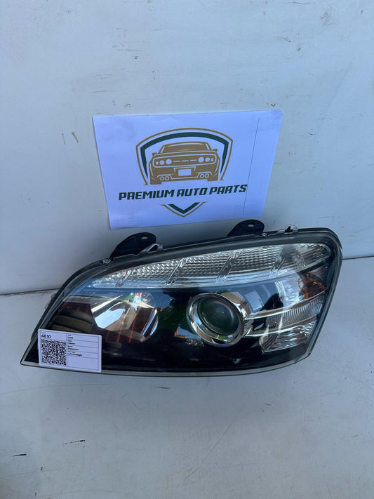 2006  WL Left Headlight