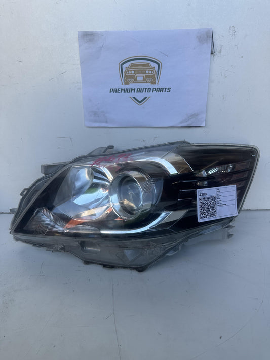 2010  V40 Left Headlight
