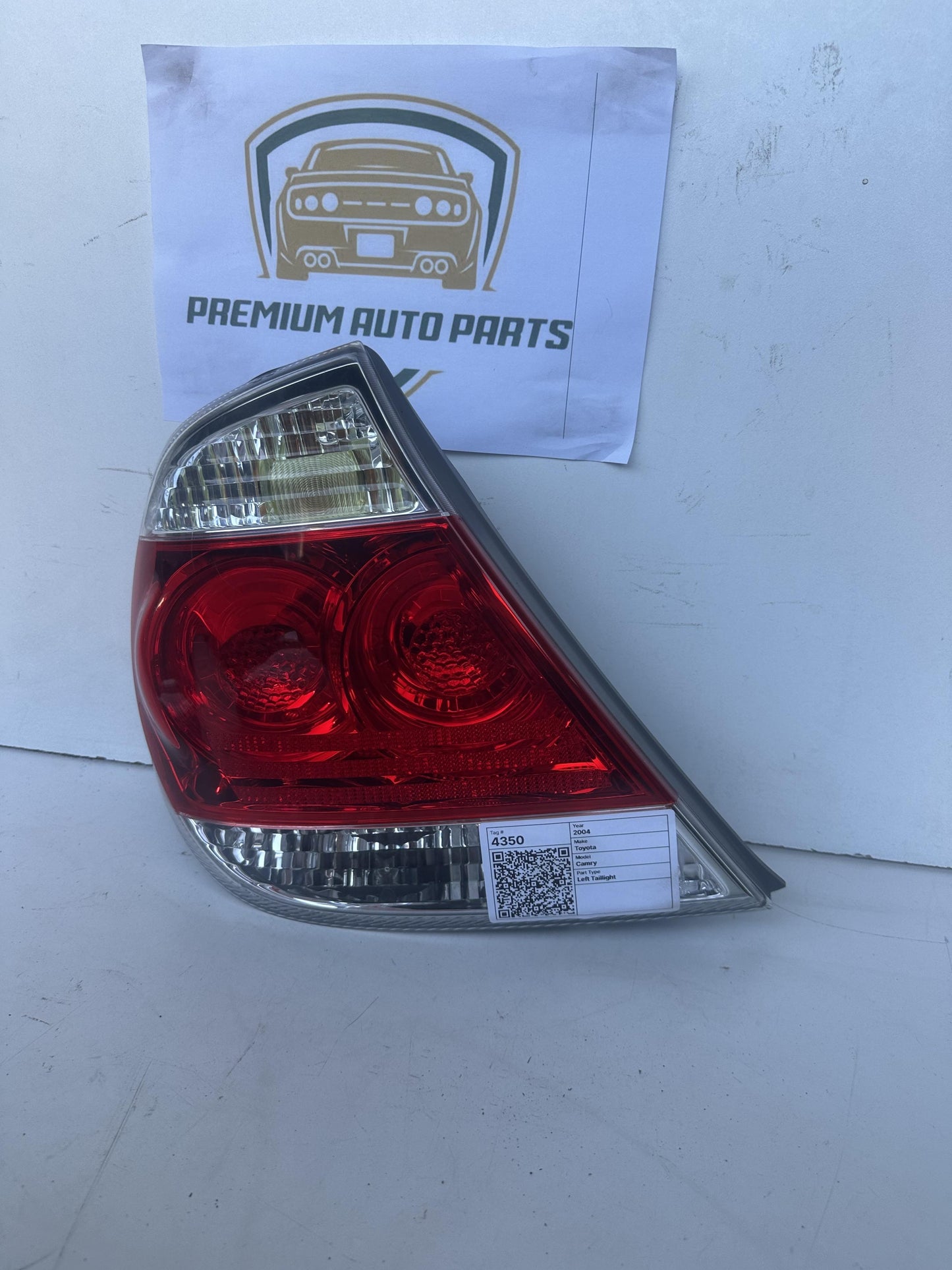 2004  V30 Left Taillight