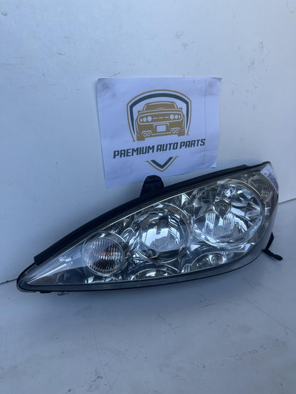2004  V30 Left Headlight