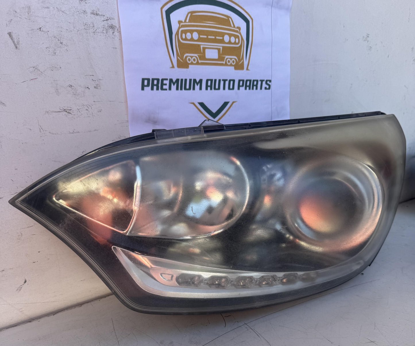 2013  UB Left Headlight