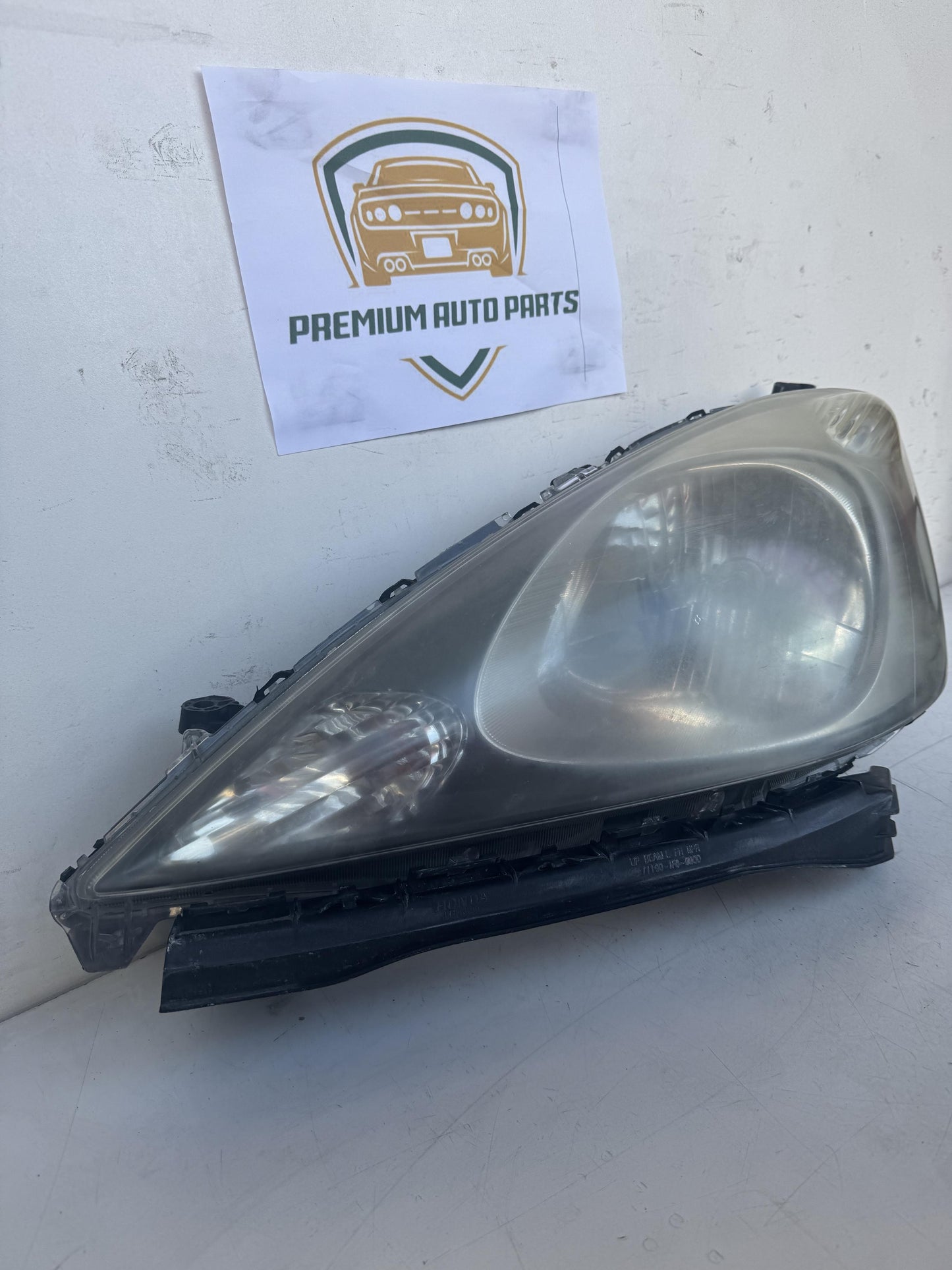 2009   Left Headlight
