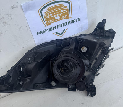 2006  W20 Left Headlight