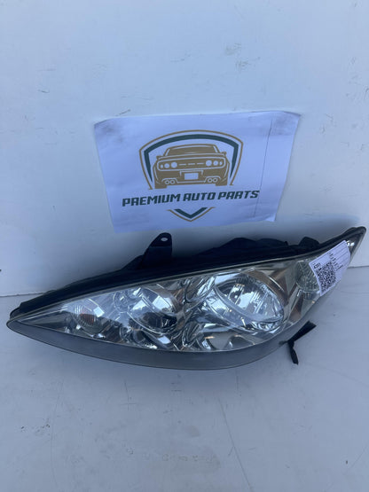 2004  V30 Left Headlight