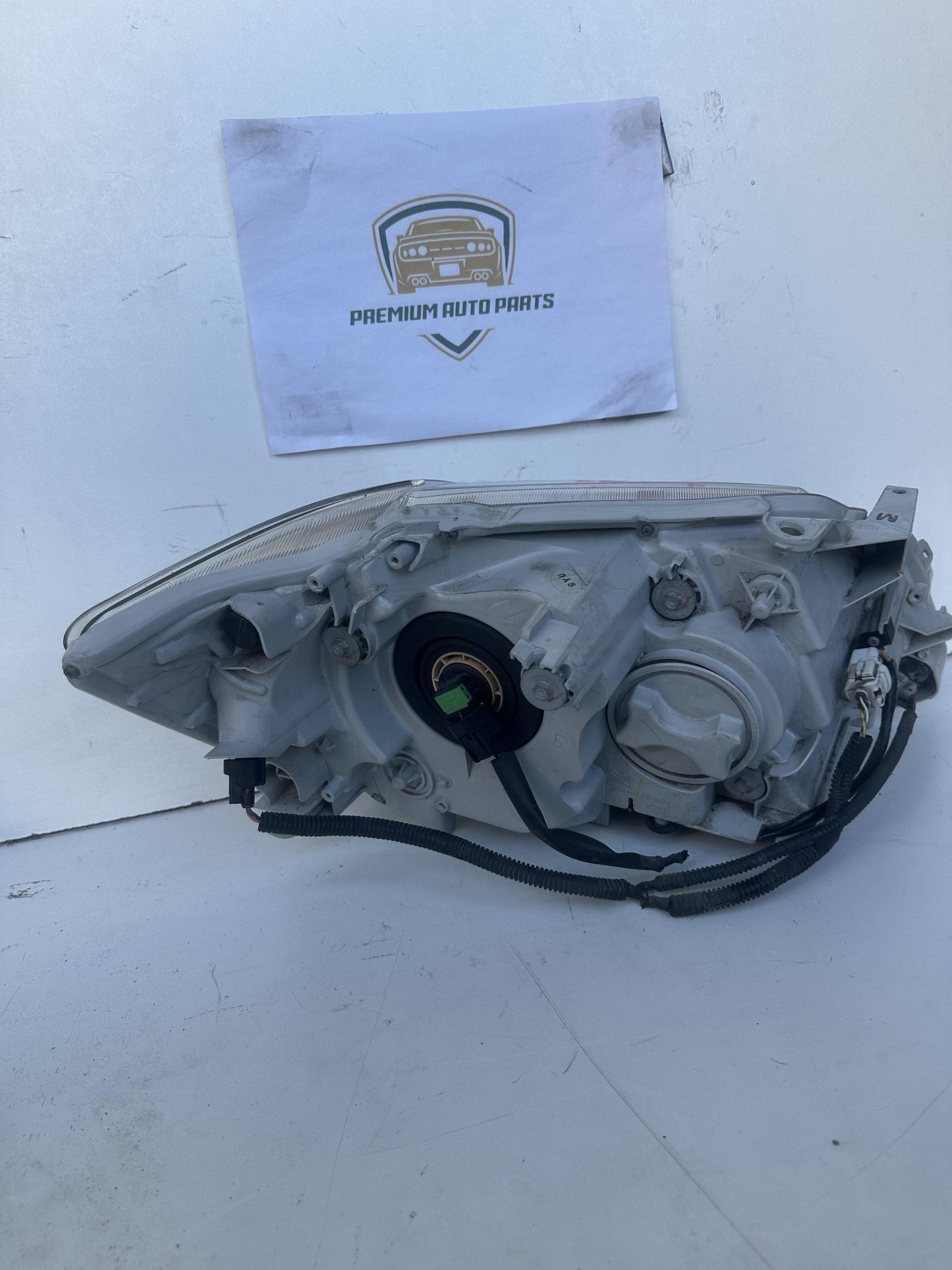 2010  V40 Left Headlight
