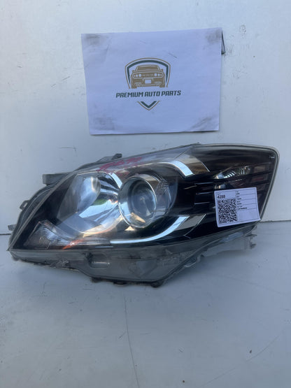 2010  V40 Left Headlight