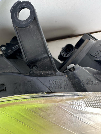2008  E150 Right Headlight