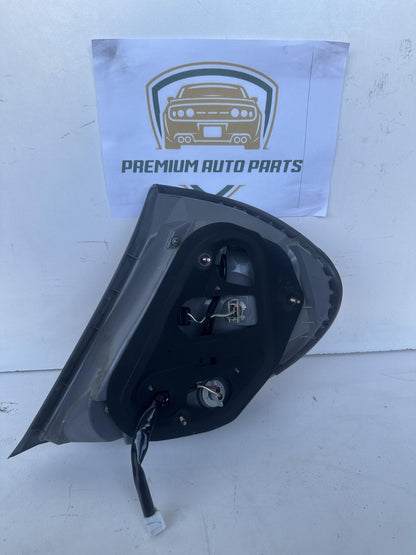 2004  V30 Left Taillight