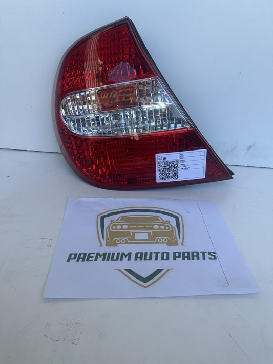 2003  V30 Left Taillight