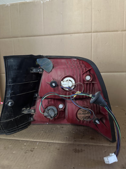 2004  WK Left Taillight