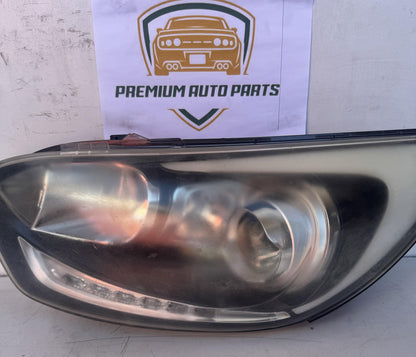 2013  UB Left Headlight
