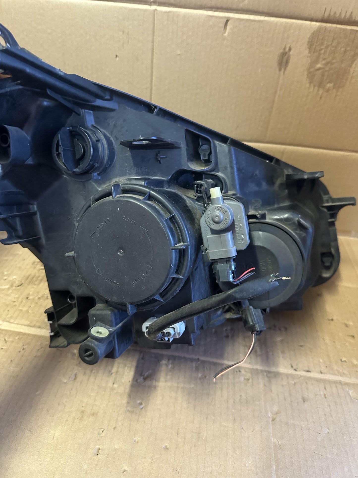 2012  I J10 Left Headlight