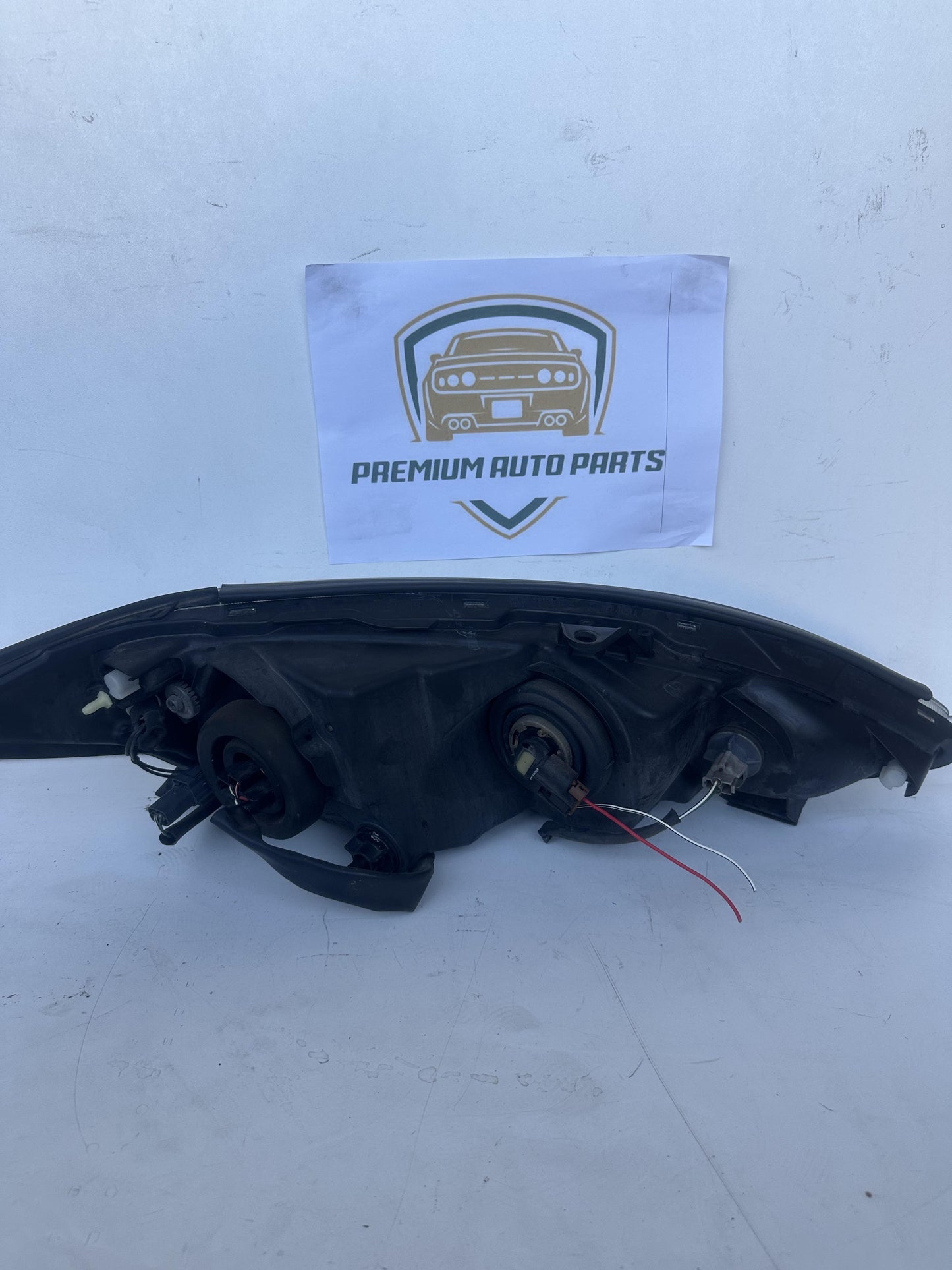 2004  V30 Left Headlight
