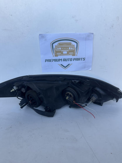 2004  V30 Left Headlight
