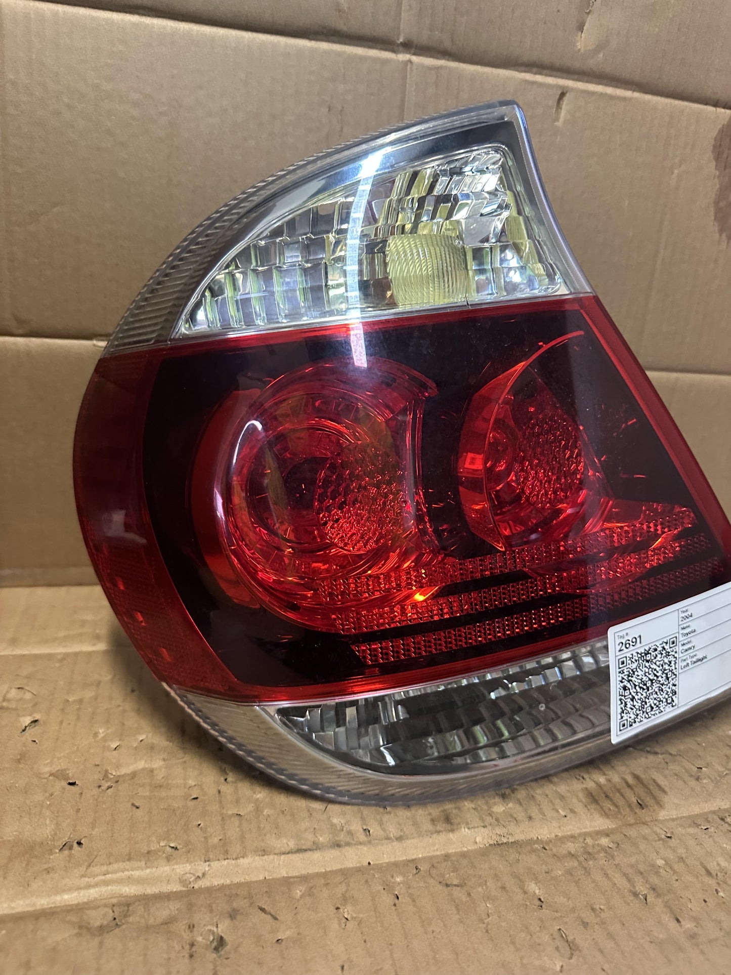2004  Sportivo Left Taillight