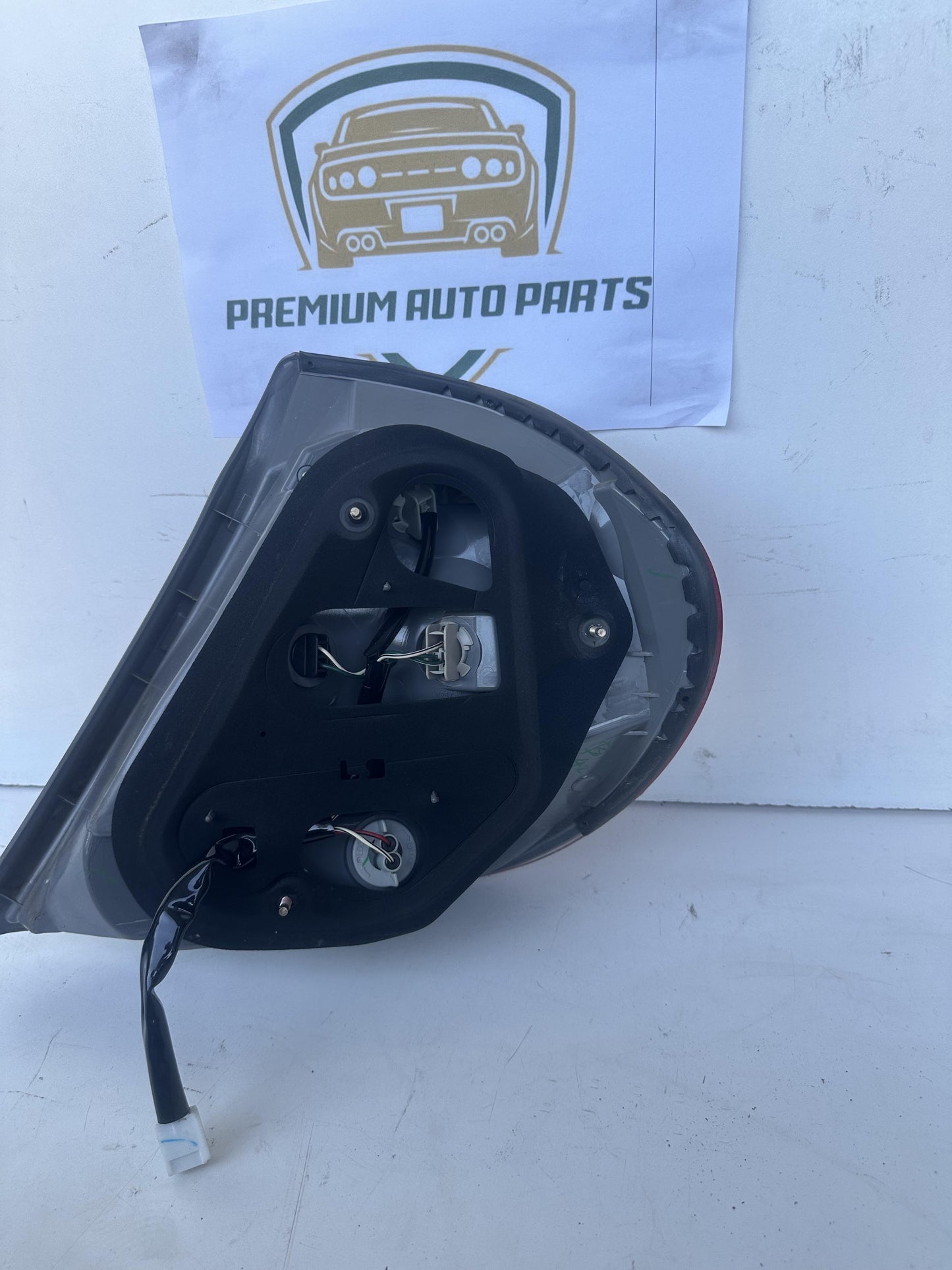 2004  V30 Left Taillight