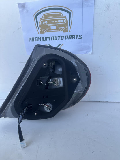 2004  V30 Left Taillight