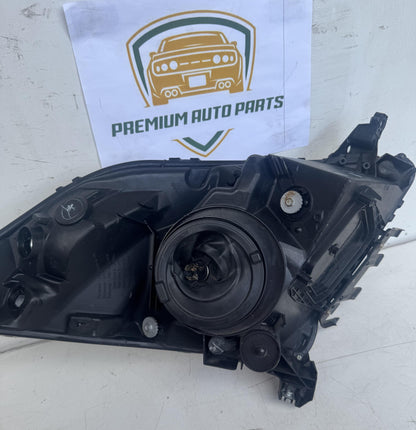 2006  W20 Left Headlight