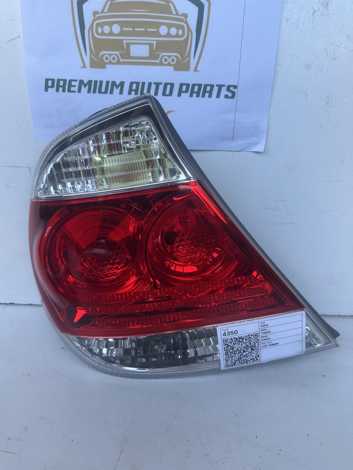 2004  V30 Left Taillight