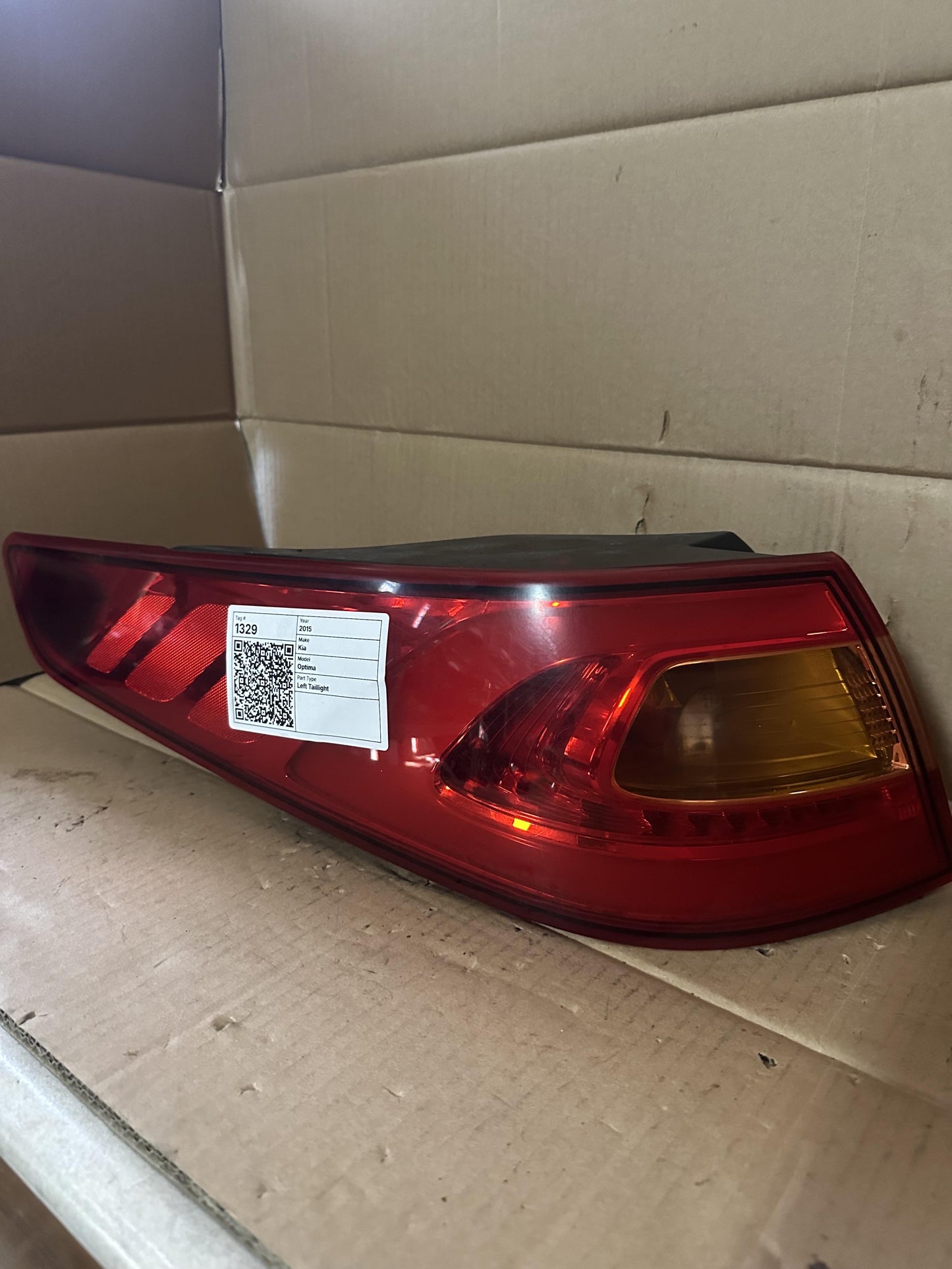 2015  Optima Left Taillight