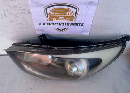 2013  UB Left Headlight