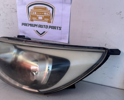 2013  UB Left Headlight