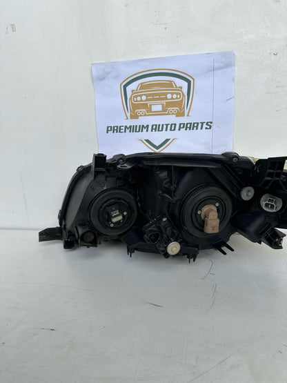 2008  E150 Right Headlight
