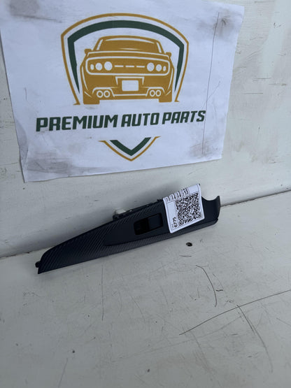 2015   Left Rear Door Window Switch Surround