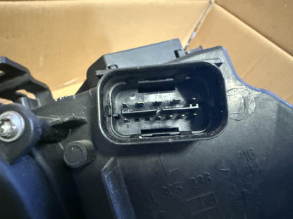 2009  E93 Left Headlight