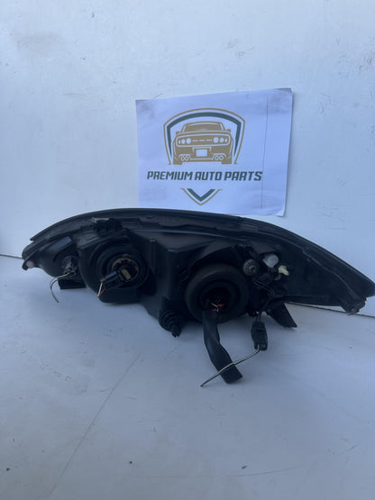 2004  V30 Right Headlight