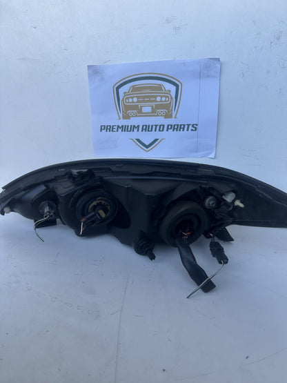 2004  V30 Right Headlight