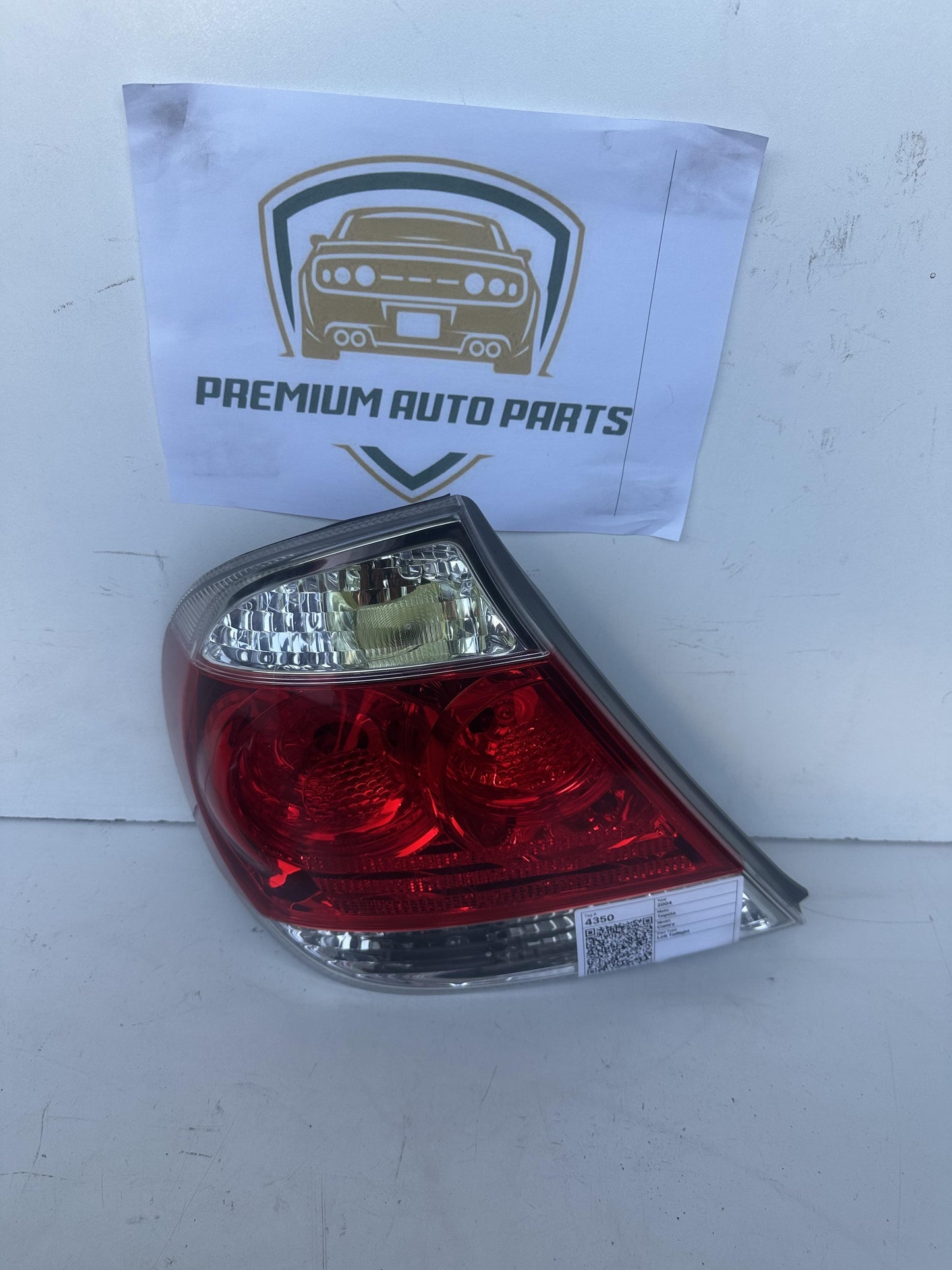 2004  V30 Left Taillight