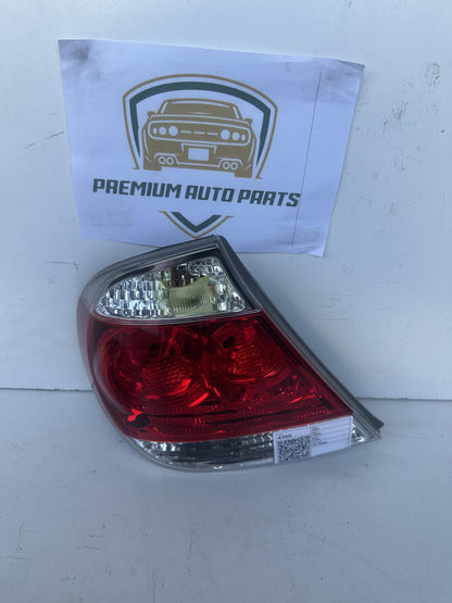 2004  V30 Left Taillight