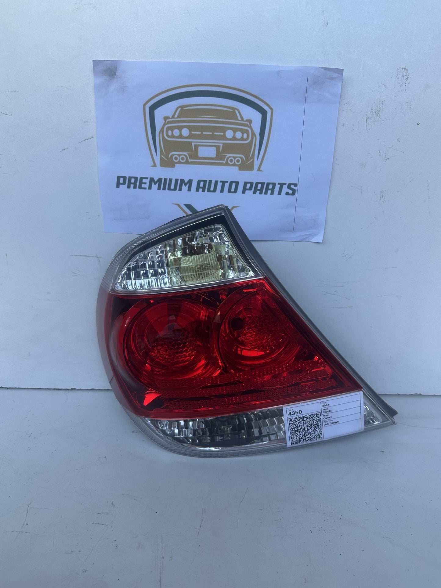 2004  V30 Left Taillight