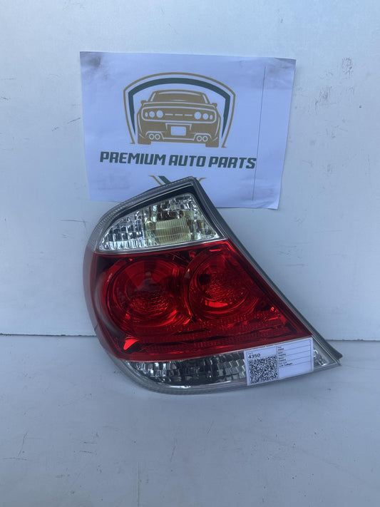 2004  V30 Left Taillight