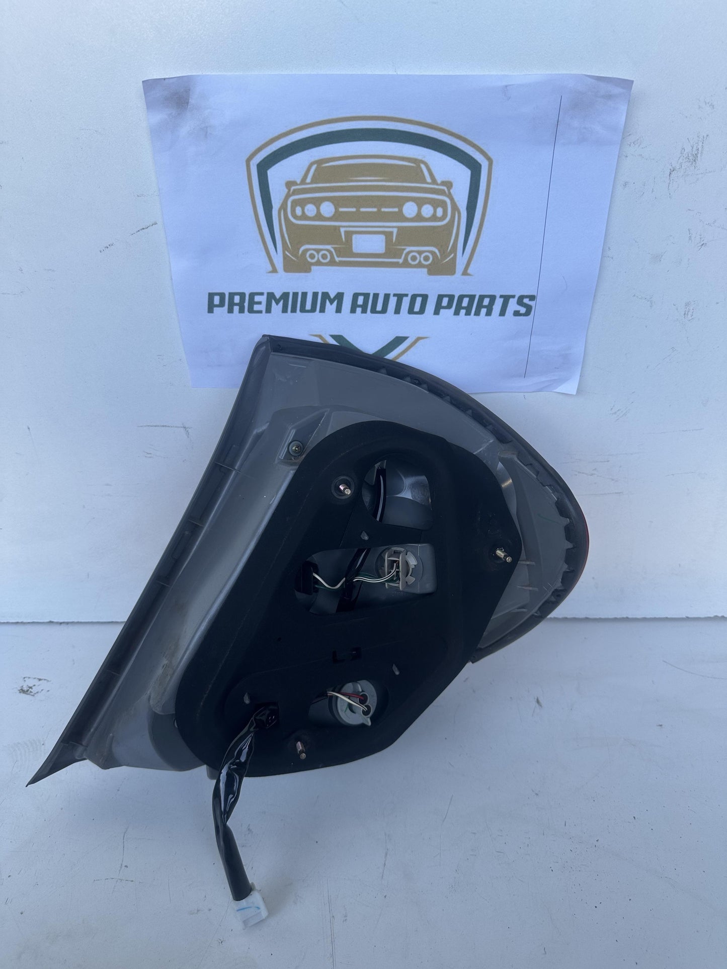2004  V30 Left Taillight