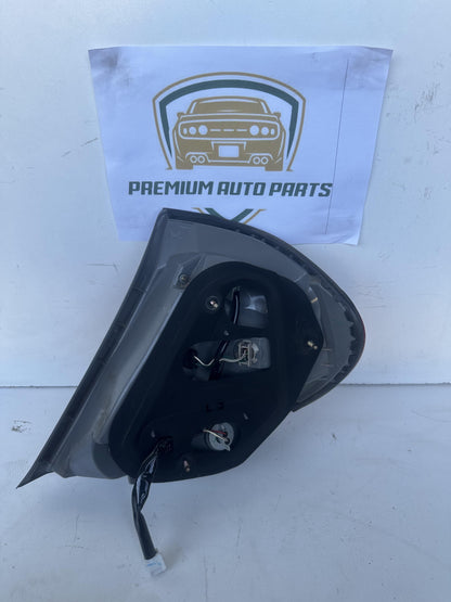 2004  V30 Left Taillight