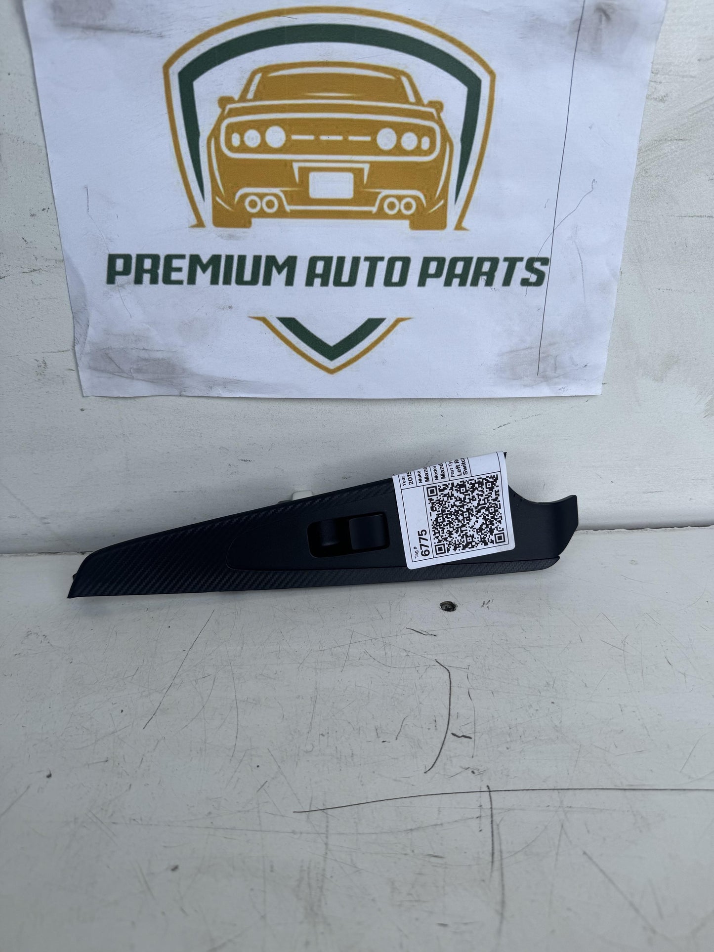 2015   Left Rear Door Window Switch Surround
