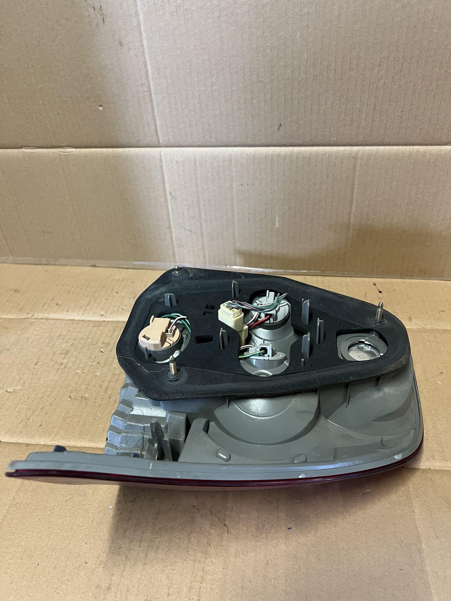 2006  E120 Left Taillight
