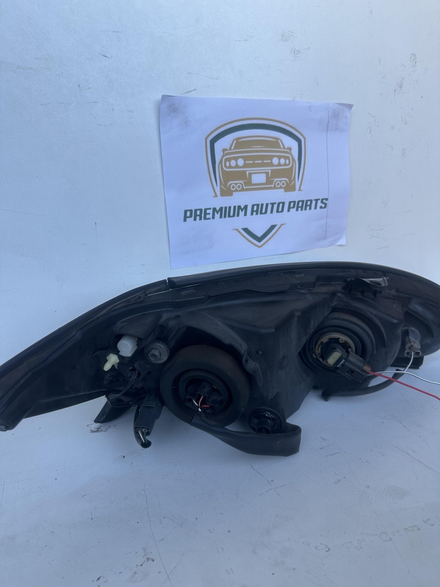 2004  V30 Left Headlight