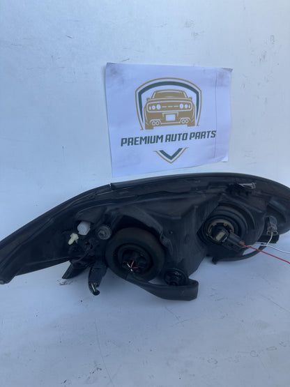 2004  V30 Left Headlight